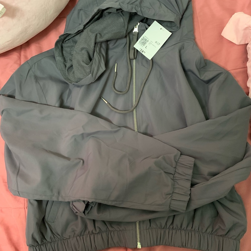 Cropped forever 21 gray windbreaker brand new with tags.